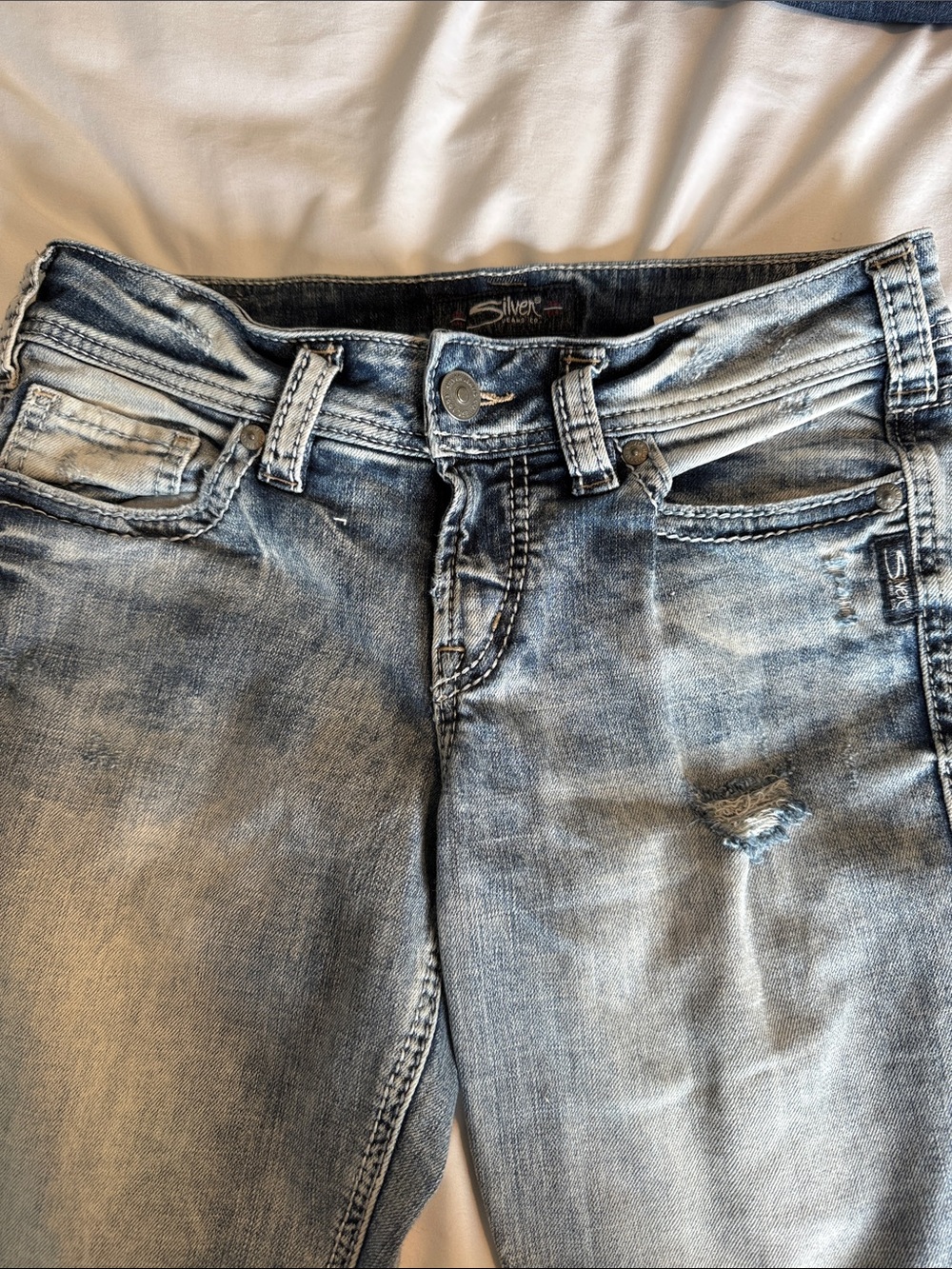Silver Jeans Light Blue Skinny Jeans with Subtle Distressing CAPRIS